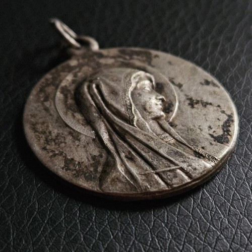 Grosse médaille patinée